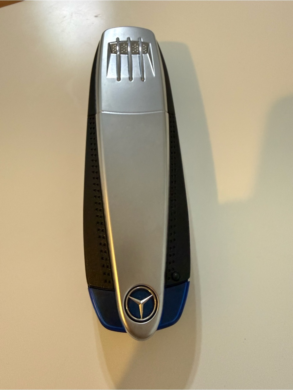 Silver and Blue Car Audio Remote Key Fob Style Controller